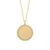 14K gold diamond disc pendant on white background – elegant fine jewelry featuring a round gold disc adorned with sparkling diamonds, hanging from a delicate gold chain.