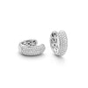 14K white gold diamond huggie earrings on white background – elegant fine jewelry featuring small hoops adorned with sparkling diamonds.
