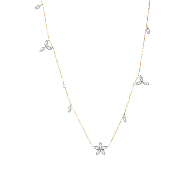 Diamond floral drop necklace on white background – elegant fine jewelry featuring a delicate floral-inspired pendant adorned with sparkling diamonds, hanging from a fine chain.