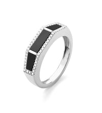 Black onyx and diamond statement ring on white background – bold fine jewelry featuring a large black onyx center stone accented with sparkling diamonds in a striking design.