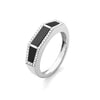 Black onyx and diamond statement ring on white background – bold fine jewelry featuring a large black onyx center stone accented with sparkling diamonds in a striking design.