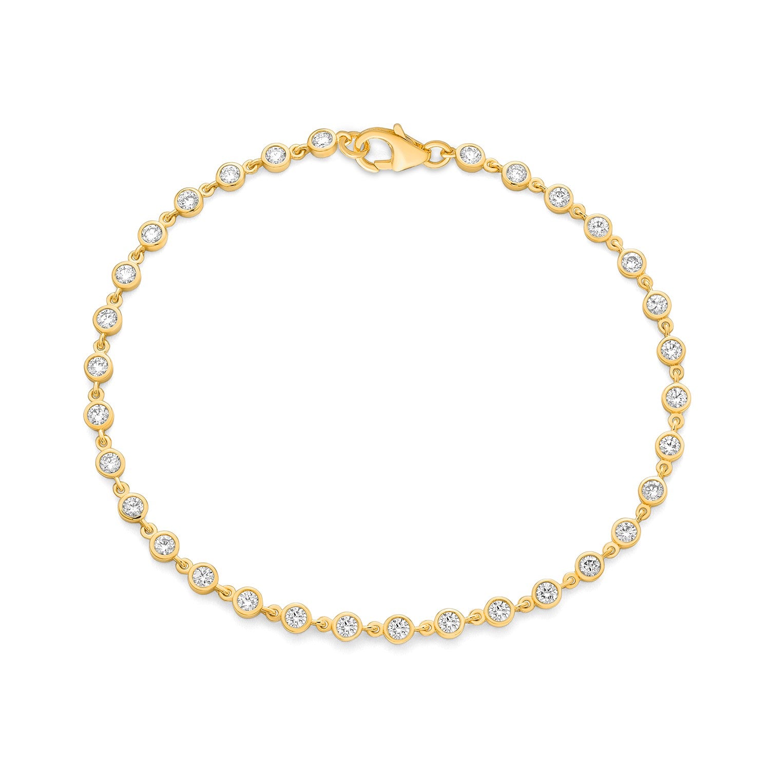 Diamond bezel bracelet in 14K yellow gold on white background – elegant fine jewelry featuring diamonds set in bezel settings along a yellow gold chain.