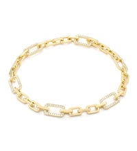 Diamond link bracelet in 14K gold on white background – elegant fine jewelry featuring interlocking gold links accented with sparkling diamonds.