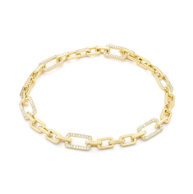 Diamond link bracelet in 14K gold on white background – elegant fine jewelry featuring interlocking gold links accented with sparkling diamonds.
