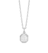 Geometric diamond cluster pendant in 14K white gold on white background – modern fine jewelry featuring a cluster of sparkling diamonds arranged in a geometric design.