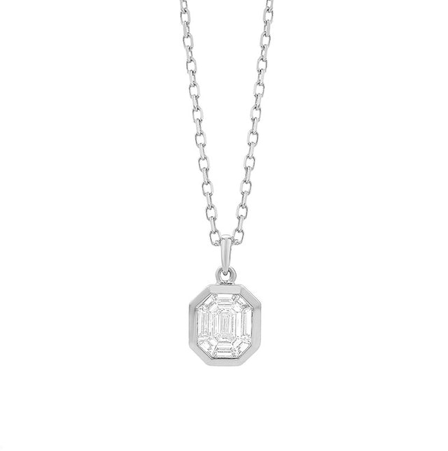 Geometric diamond cluster pendant in 14K white gold on white background – modern fine jewelry featuring a cluster of sparkling diamonds arranged in a geometric design.