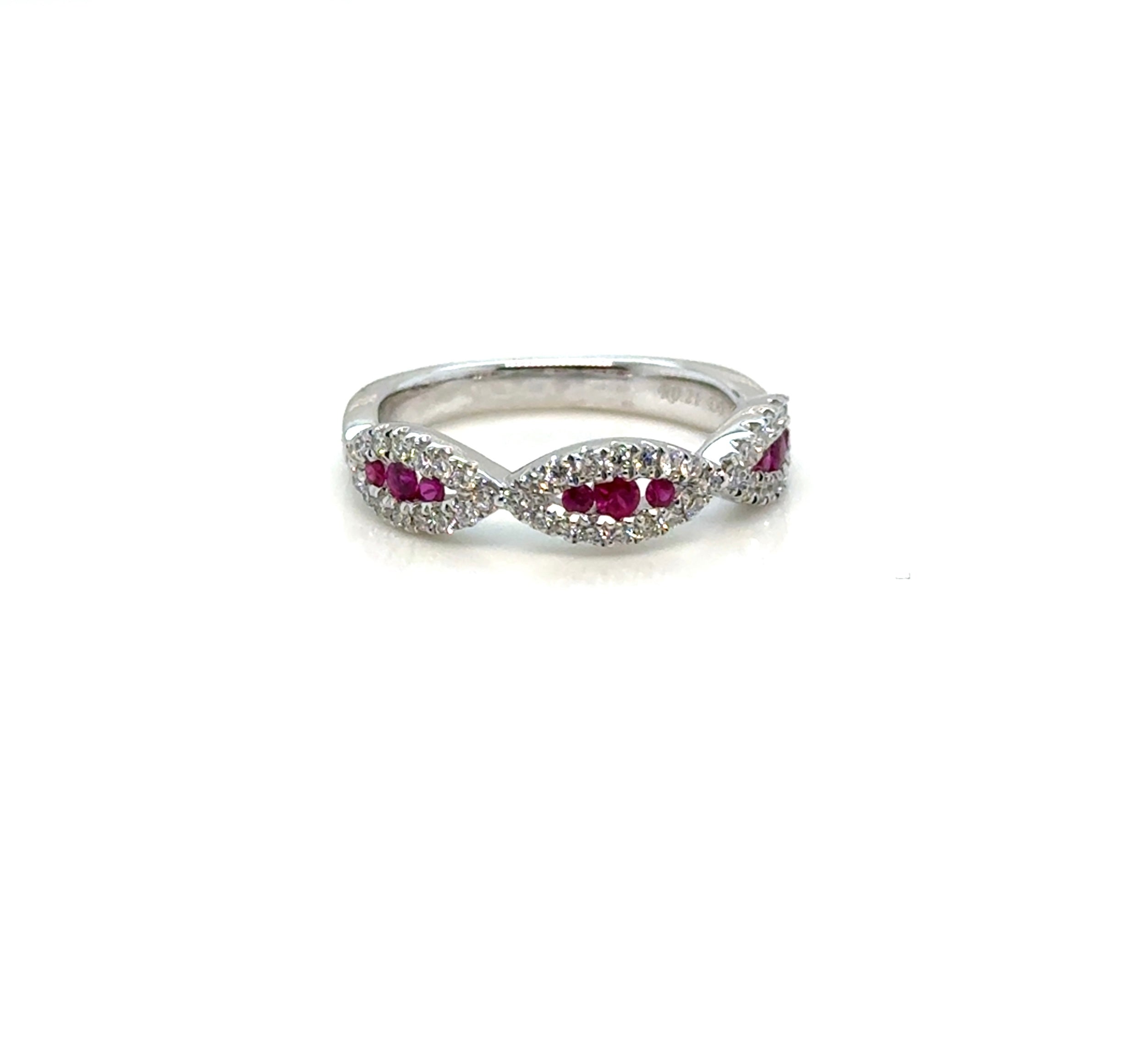 Ruby and diamond 14K gold ring on white background – fine jewelry featuring a deep red ruby accented by brilliant diamonds in a classic yellow gold setting.