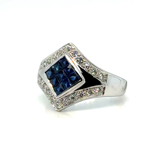Sapphire mosaic diamond ring in 18K gold on white background – luxurious fine jewelry featuring a mosaic pattern of blue sapphires and sparkling diamonds set in 18-karat yellow gold.